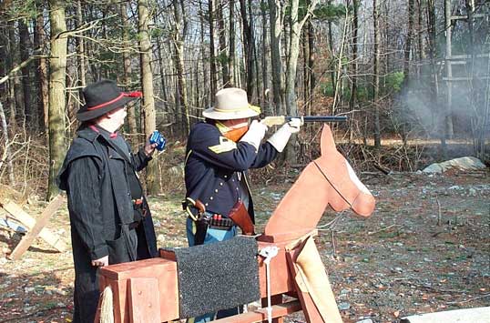 Dakota Joe with rifle at Scituate Spring Shoot.