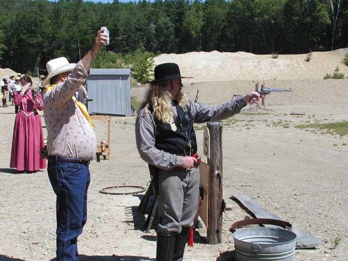 Shooting pistol at 2002 NH State Cowboy Action Shooting Championships.