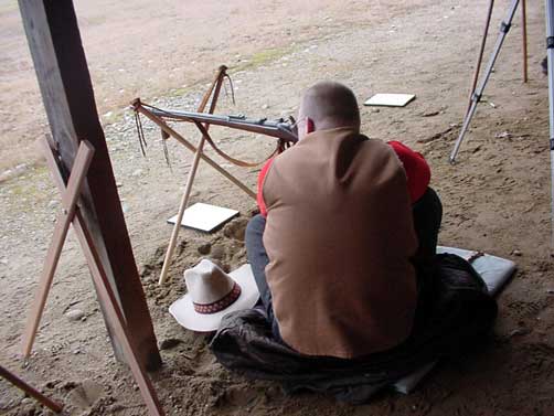 Angus 'T-Bone' Galloway shooting cross-sticks.
