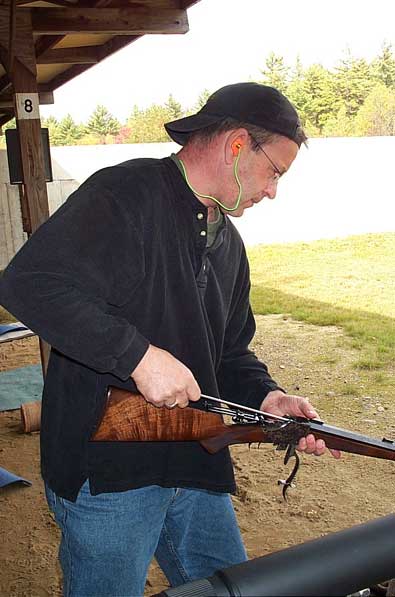 Ron Orcutt cleaning his barrel between shots.