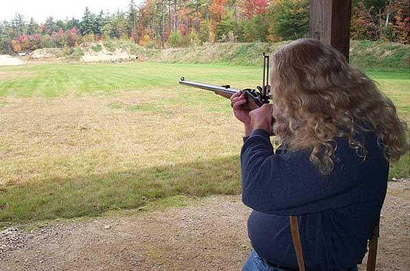 Shooting a Sharps 1874 Rifle offhand at 200 yards.